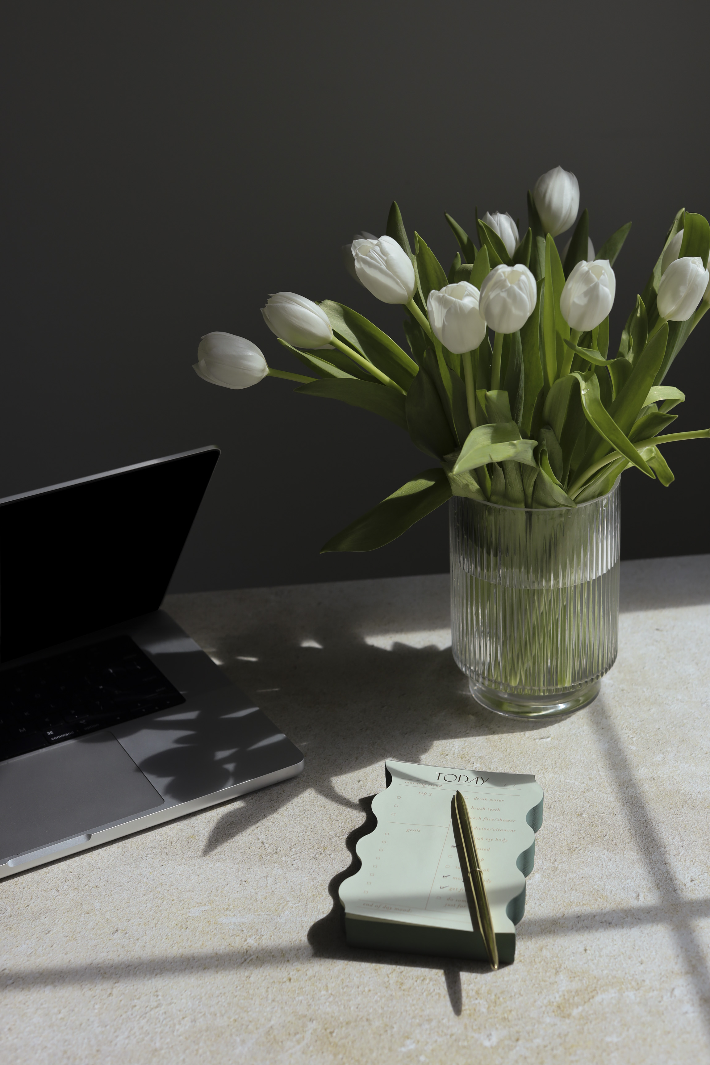 A bright desk with fresh tulips